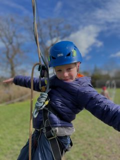 Happy smiles after whizzing down the zip line!